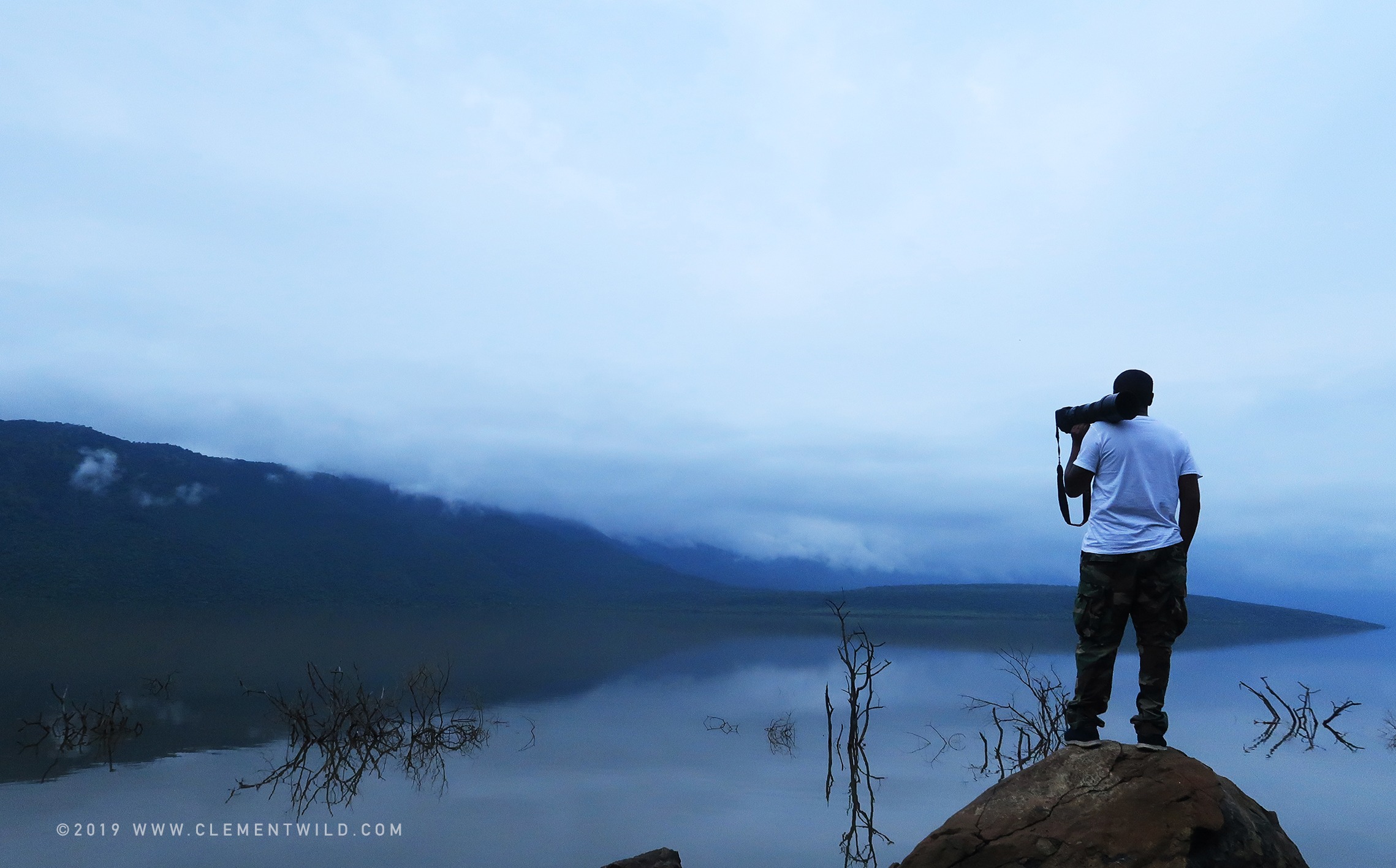 Clement Kiragu | ClementWild Tour leader exploring the landscape on a photo safari in Kenya