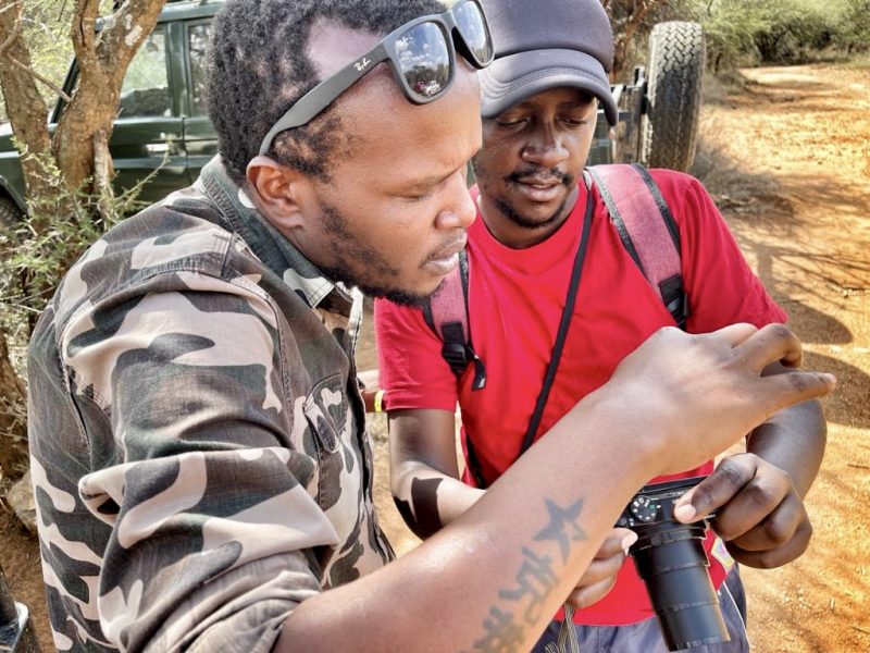 Clement teaching photography, Clement Kiragu