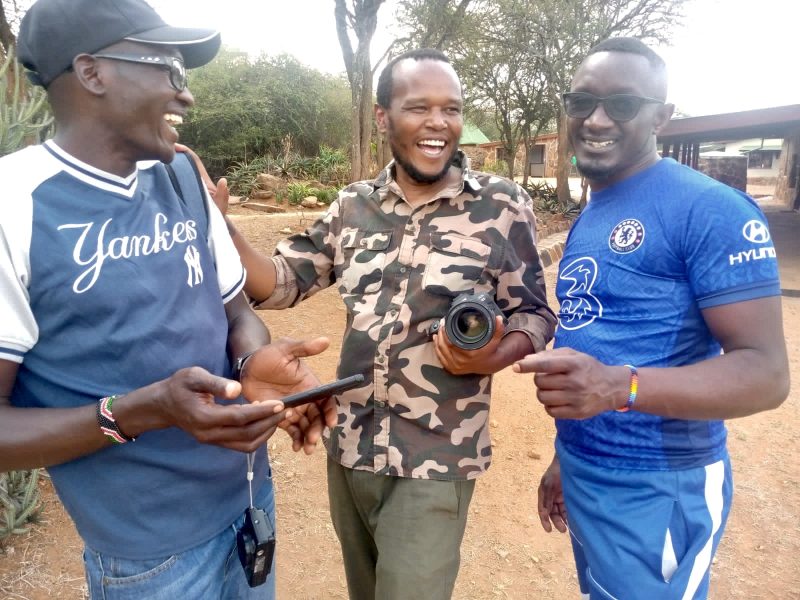 Clement teaching photography, Clement Kiragu