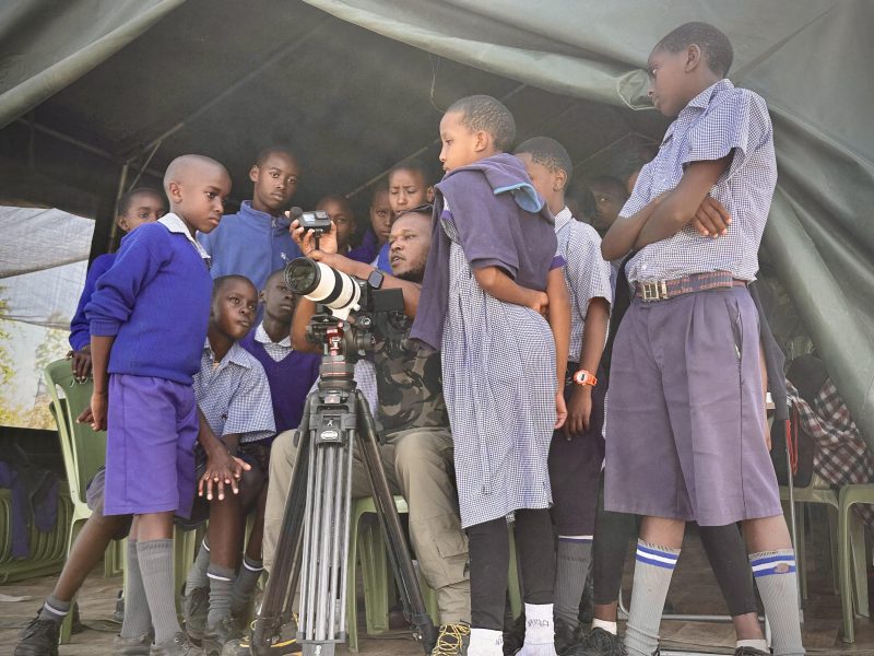 Clement teaching photography, Clement Kiragu